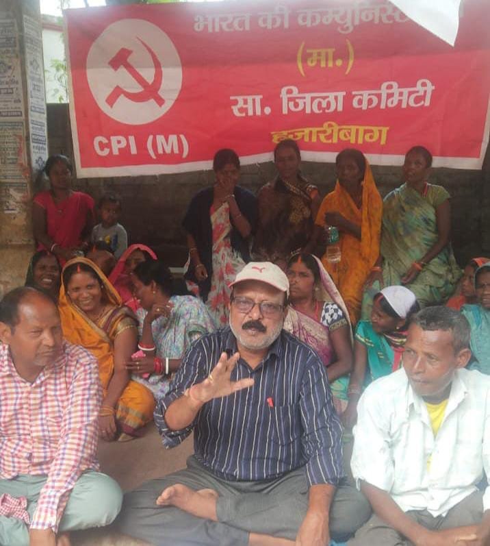 CITU staged a sit in protest demanding the filling of potholes and the commissioning of water towers before Durga Puja
