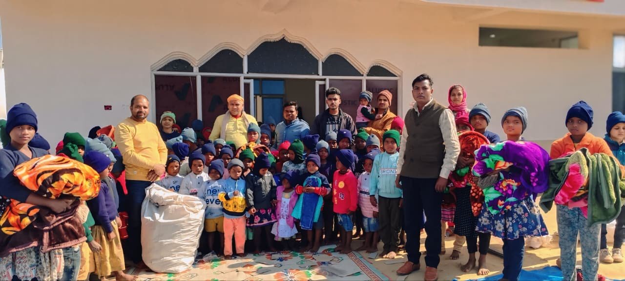 Nirdosh Kumar a resident of Satbarwa distributed warm clothes to hundreds of children of RPS Orphanage
