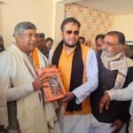 Tony Jain congratulated the newly elected BJP state president Aditya Sahu and presented him with the Shri Ramcharit Manas
